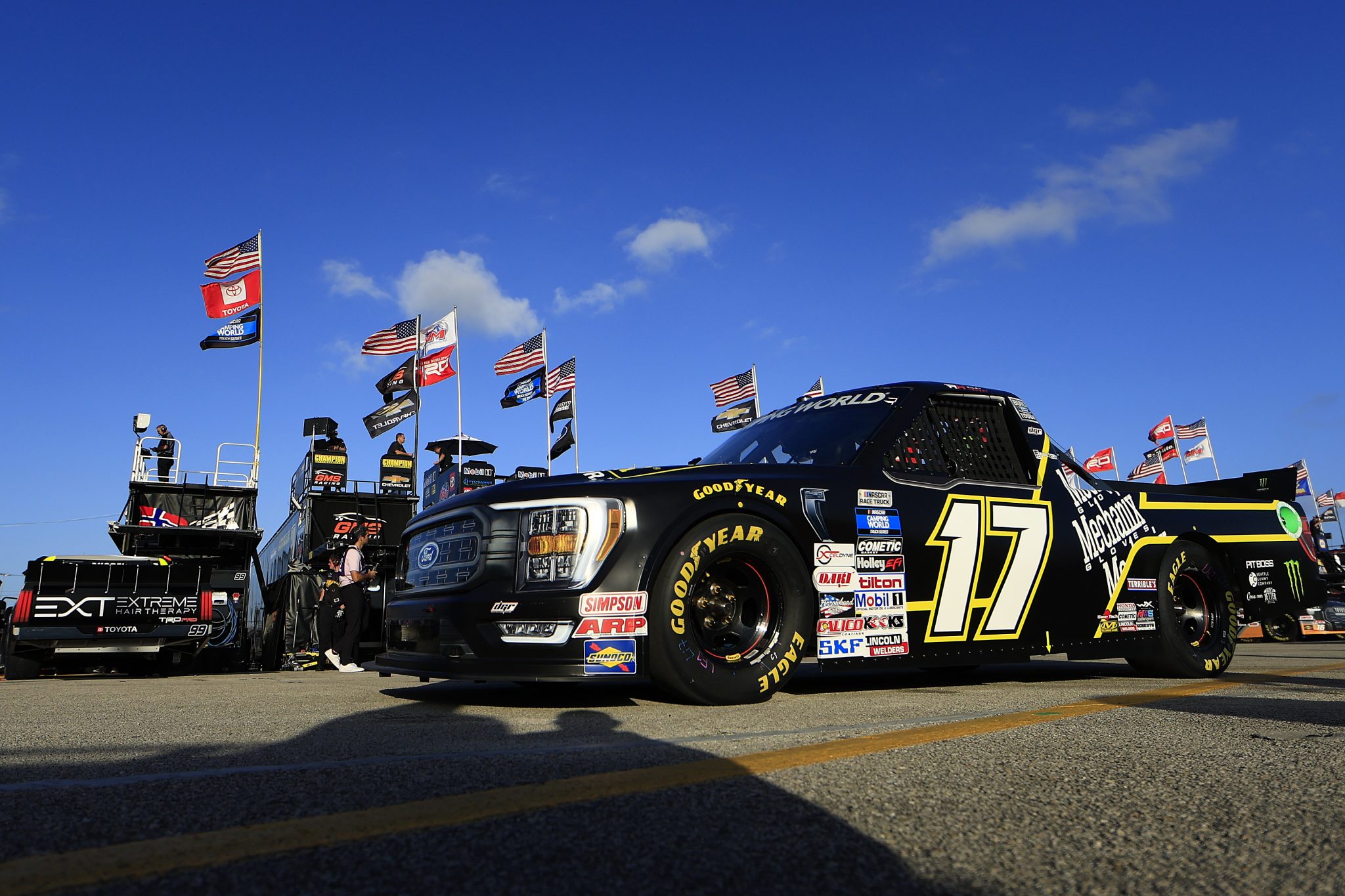 DAYTONA BEACH, FLORIDA - FEBRUARY 17: Riley Herbst, driver of the #17 Mechanix Wear Ford, drives through the garage area during practice for the NASCAR Camping World Truck Series NextEra Energy 250 at Daytona International Speedway on February 17, 2022 in Daytona Beach, Florida. (Photo by Mike Ehrmann/Getty Images) | Getty Images