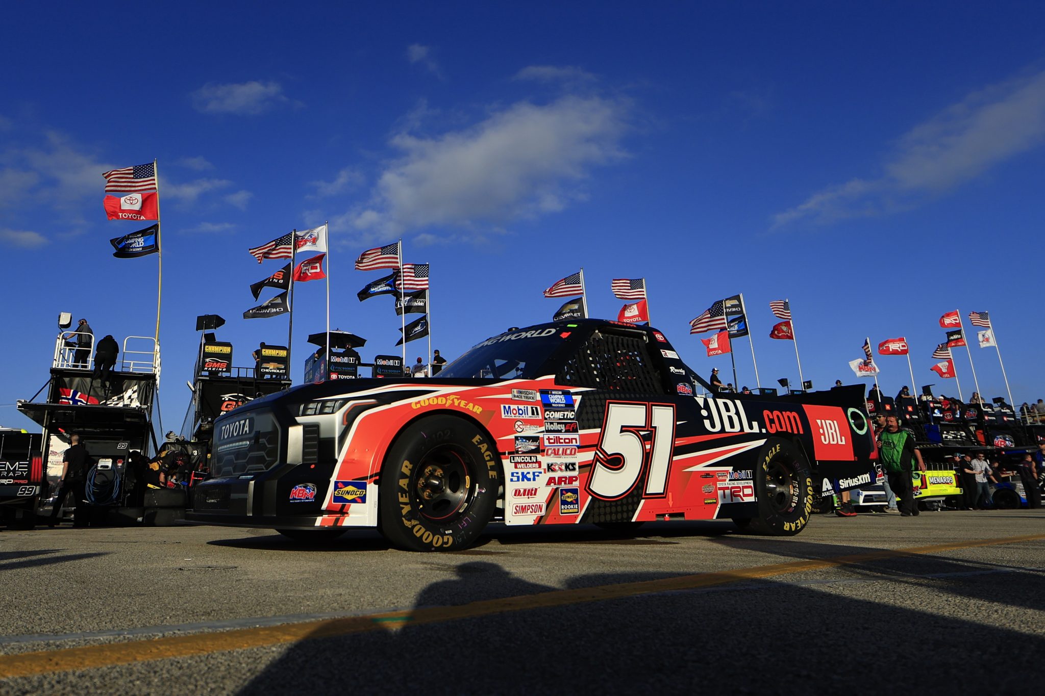 DAYTONA BEACH, FLORIDA - FEBRUARY 17: Corey Heim, driver of the #51 JBL Toyota, drives through the garage area during practice for the NASCAR Camping World Truck Series NextEra Energy 250 at Daytona International Speedway on February 17, 2022 in Daytona Beach, Florida. (Photo by Mike Ehrmann/Getty Images) | Getty Images