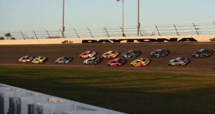 DAYTONA BEACH, FLORIDA - FEBRUARY 20: Austin Cindric, driver of the #2 Discount Tire Ford, and Ryan Blaney, driver of the #12 Menards/Blue DEF/PEAK Ford, lead the field during the NASCAR Cup Series 64th Annual Daytona 500 at Daytona International Speedway on February 20, 2022 in Daytona Beach, Florida. (Photo by James Gilbert/Getty Images) | Getty Images
