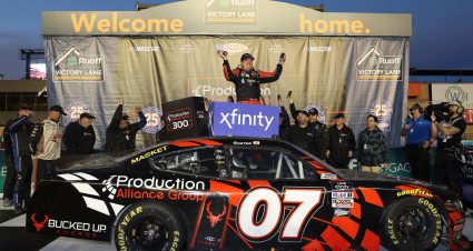 FONTANA, CALIFORNIA - FEBRUARY 26: Cole Custer, driver of the #07 Production Alliance Group Ford, celebrates in the Ruoff Mortgage victory lane after winning the NASCAR Xfinity Series Production Alliance 300 at Auto Club Speedway on February 26, 2022 in Fontana, California. (Photo by James Gilbert/Getty Images) | Getty Images