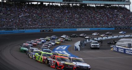 AVONDALE, ARIZONA - NOVEMBER 07: Martin Truex Jr., driver of the #19 Bass Pro Shops Toyota, and Denny Hamlin, driver of the #11 FedEx Express Toyota, lead the field during the NASCAR Cup Series Championship at Phoenix Raceway on November 07, 2021 in Avondale, Arizona. (Photo by Sean Gardner/Getty Images) | Getty Images