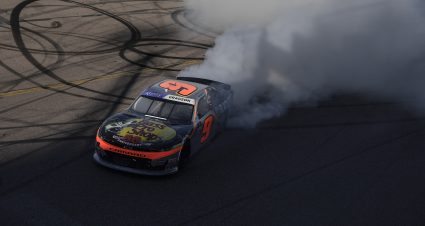 AVONDALE, ARIZONA - MARCH 12: Noah Gragson, driver of the #9 Bass Pro Shops/TrueTimber/BRCC Chevrolet, celebrates with a burnout after winning the NASCAR Xfinity Series United Rentals 200 at Phoenix Raceway on March 12, 2022 in Avondale, Arizona. (Photo by Logan Riely/Getty Images) | Getty Images