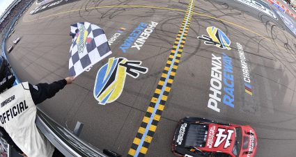 AVONDALE, ARIZONA - MARCH 13: Chase Briscoe, driver of the #14 Mahindra Tractors Ford, crosses the finish line to win the Ruoff Mortgage 500 at Phoenix Raceway on March 13, 2022 in Avondale, Arizona. (Photo by Logan Riely/Getty Images) | Getty Images