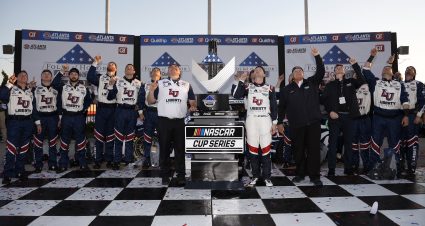 HAMPTON, GEORGIA - MARCH 20: William Byron, driver of the #24 Liberty University Chevrolet, and crew celebrate n victory lane after winning the NASCAR Cup Series Folds of Honor QuikTrip 500 at Atlanta Motor Speedway on March 20, 2022 in Hampton, Georgia. (Photo by Sean Gardner/Getty Images) | Getty Images