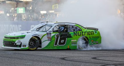 AUSTIN, TEXAS - MARCH 26: AJ Allmendinger, driver of the #16 Nutrien Ag Solutions Chevrolet, celebrates with a burnout after winning he NASCAR Xfinity Series Pit Boss 250 at Circuit of The Americas on March 26, 2022 in Austin, Texas. (Photo by Dylan Buell/Getty Images) | Getty Images