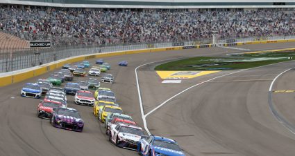 LAS VEGAS, NEVADA - MARCH 07: Kyle Larson, driver of the #5 HendrickCars.com Chevrolet, Denny Hamlin, driver of the #11 FedEx Ground Toyota, and Alex Bowman, driver of the #48 Ally Chevrolet, lead the field during the NASCAR Cup Series Pennzoil 400 presented by Jiffy Lube at the Las Vegas Motor Speedway on March 07, 2021 in Las Vegas, Nevada. (Photo by Brian Lawdermilk/Getty Images) | Getty Images