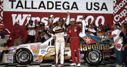 TALLADEGA, AL - MAY 3, 1987: Davey Allison and his crew celebrate in victory lane following their win in the Winston 500 at Alabama International Motor Speedway. It was Allison's first career NASCAR Cup victory. (Photo by ISC Images & Archives via Getty Images)