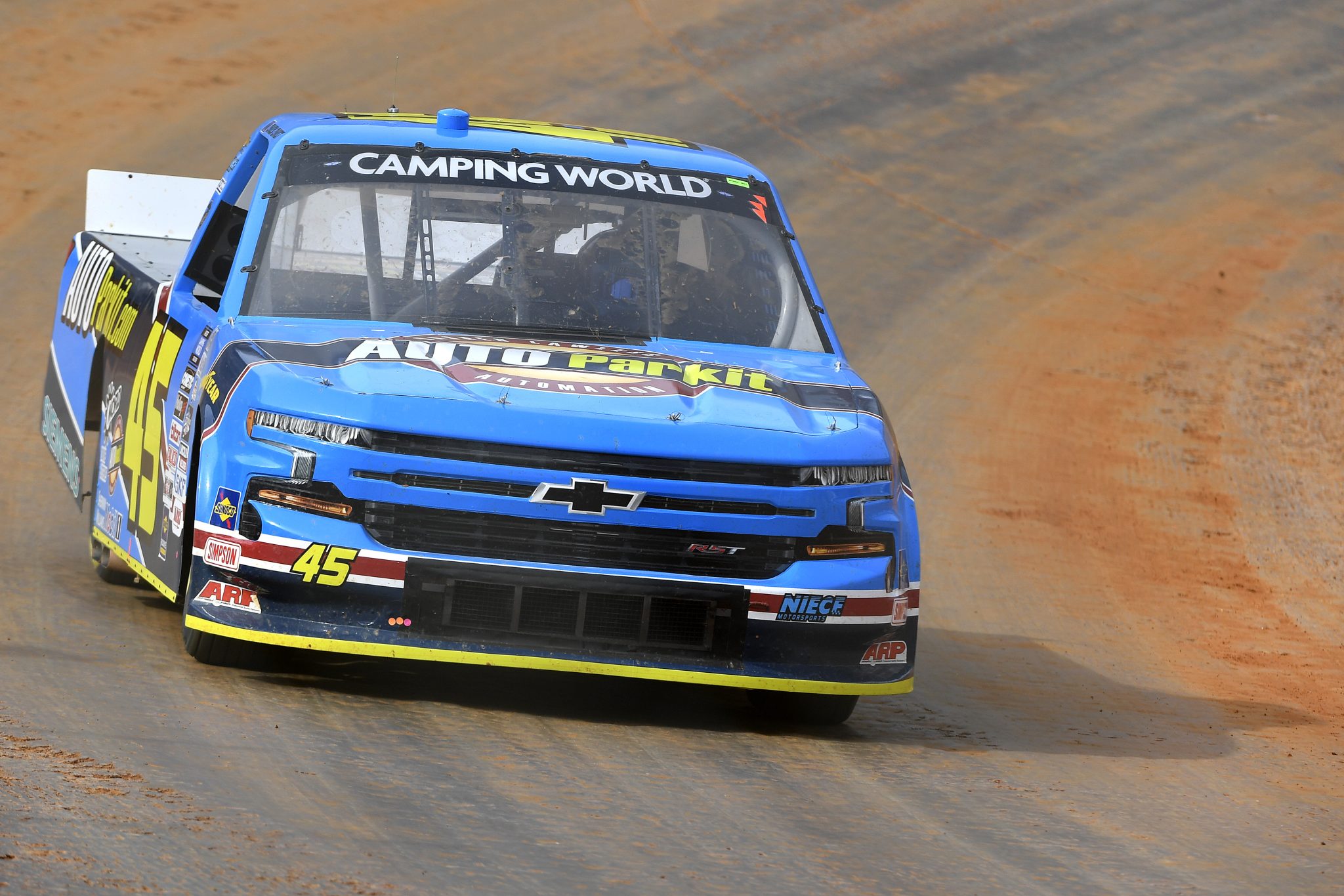 BRISTOL, TENNESSEE - APRIL 15: Lawless Alan, driver of the #45 AUTOParkIt.com Chevrolet, drives during first practice for the NASCAR Camping World Truck Series Pinty's Truck Race on Dirt at Bristol Motor Speedway on April 15, 2022 in Bristol, Tennessee. (Photo by Logan Riely/Getty Images) | Getty Images