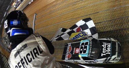 BRISTOL, TENNESSEE - APRIL 16: Ben Rhodes, driver of the #99 Tenda Toyota, takes the checkered flag to win the NASCAR Camping World Truck Series Pinty's Truck Race on Dirt at Bristol Motor Speedway on April 16, 2022 in Bristol, Tennessee. (Photo by Logan Riely/Getty Images) | Getty Images