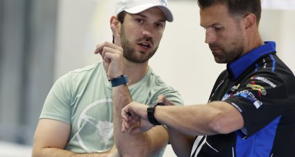 CONCORD, NORTH CAROLINA - OCTOBER 11: Daniel Suarez, driver of the #99 Next Gen car and crew chief Travis Mack talk in the garage area during the NASCAR Cup Series test at the Charlotte Motor Speedway on October 11, 2021 in Concord, North Carolina. (Photo by Bob Leverone/Getty Images) | Getty Images