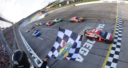 TALLADEGA, ALABAMA - APRIL 24: Ross Chastain, driver of the #1 Moose Fraternity Chevrolet, takes the checkered flag to win the NASCAR Cup Series GEICO 500 at Talladega Superspeedway on April 24, 2022 in Talladega, Alabama. (Photo by James Gilbert/Getty Images) | Getty Images