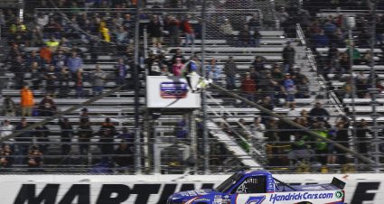 MARTINSVILLE, VIRGINIA - APRIL 07: William Byron, driver of the #7 HendrickCars.com Chevrolet, takes the checkered flag to win the NASCAR Camping World Truck Series Blu-Emu Maximum Pain Relief 200 at Martinsville Speedway on April 07, 2022 in Martinsville, Virginia. (Photo by Jared C. Tilton/Getty Images) | Getty Images