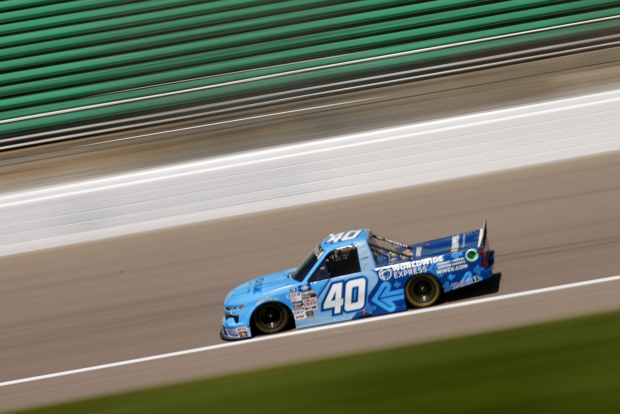 KANSAS CITY, KANSAS - MAY 14: Dean Thompson, driver of the #40 Worldwide Express Chevrolet, drives during practice for the NASCAR Camping World Truck Series Heart of America 200 at Kansas Speedway on May 14, 2022 in Kansas City, Kansas. (Photo by Chris Graythen/Getty Images) | Getty Images