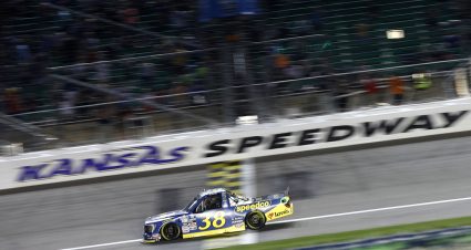 KANSAS CITY, KANSAS - MAY 14: Zane Smith, driver of the #38 Speedco Ford, crosses the finish line to win the NASCAR Camping World Truck Series Heart of America 200 at Kansas Speedway on May 14, 2022 in Kansas City, Kansas. (Photo by Chris Graythen/Getty Images) | Getty Images