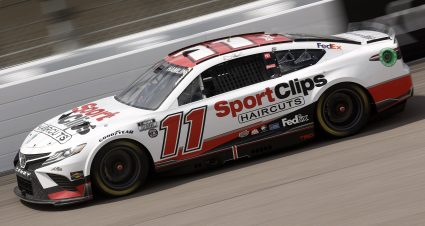KANSAS CITY, KANSAS - MAY 15: Denny Hamlin, driver of the #11 Sport Clips Haircuts Toyota, drives during the NASCAR Cup Series AdventHealth 400 at Kansas Speedway on May 15, 2022 in Kansas City, Kansas. (Photo by Chris Graythen/Getty Images) | Getty Images