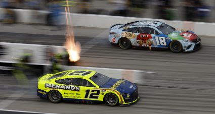 FORT WORTH, TEXAS - MAY 21: Ryan Blaney, driver of the #12 Menards/Wrangler Ford, and Kyle Busch, driver of the #18 M&M's Crunchy Cookie Toyota, race during the elimination bracket qualifying for the NASCAR Cup Series All-Star Race at Texas Motor Speedway on May 21, 2022 in Fort Worth, Texas. (Photo by Chris Graythen/Getty Images) | Getty Images