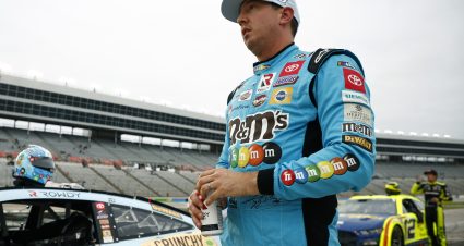 FORT WORTH, TEXAS - MAY 21: Kyle Busch, driver of the #18 M&M's Crunchy Cookie Toyota, and Ryan Blaney, driver of the #12 Menards/Wrangler Ford, wait on the grid during the elimination bracket qualifying for the NASCAR Cup Series All-Star Race at Texas Motor Speedway on May 21, 2022 in Fort Worth, Texas. (Photo by Jared C. Tilton/Getty Images) | Getty Images