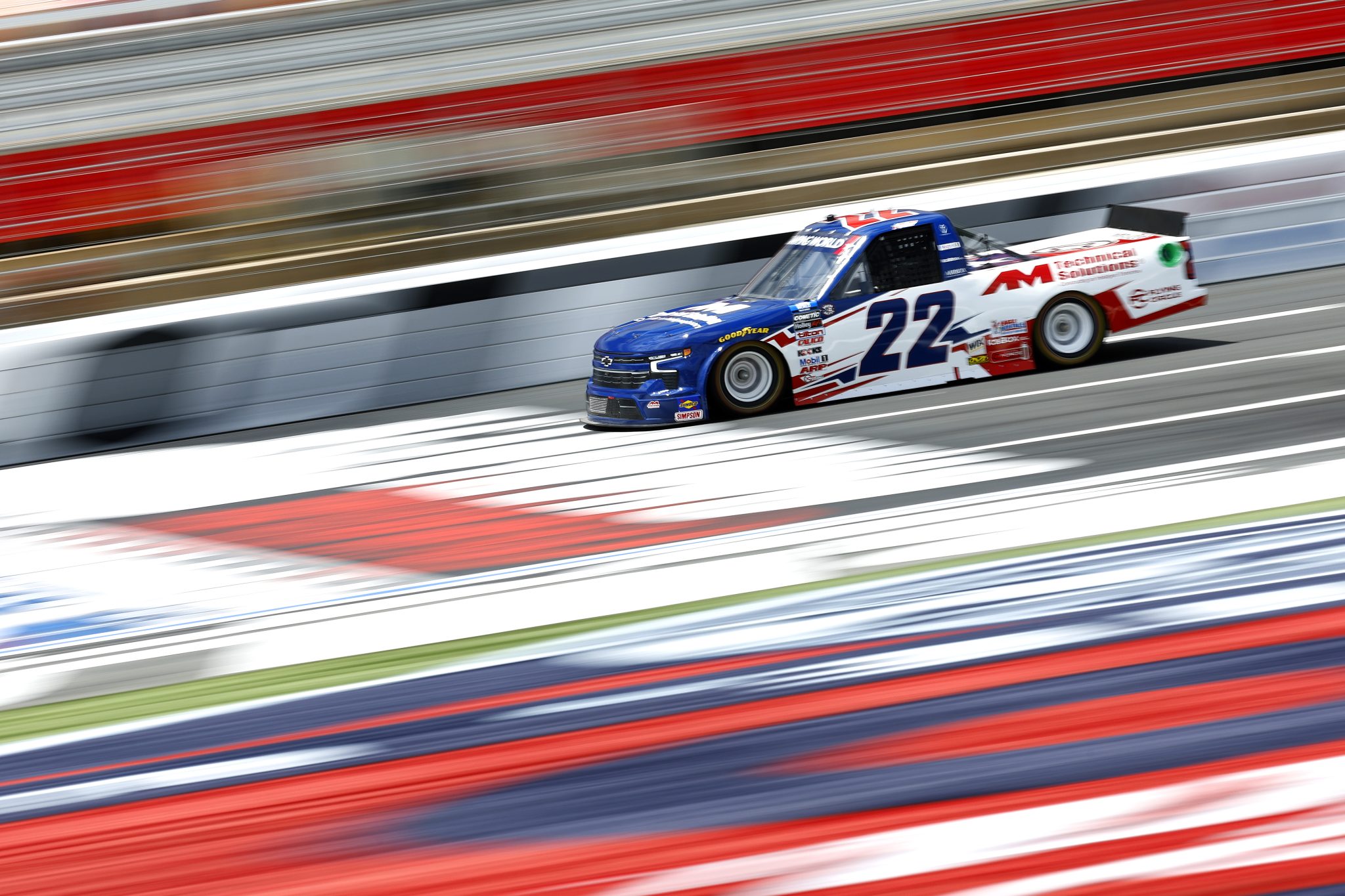 CONCORD, NORTH CAROLINA - MAY 27: Austin Wayne Self, driver of the #22 AM Technical Solutions Chevrolet, drives during practice for the NASCAR Camping World Truck Series North Carolina Education Lottery 200 at Charlotte Motor Speedway on May 27, 2022 in Concord, North Carolina. (Photo by Jared C. Tilton/Getty Images) | Getty Images