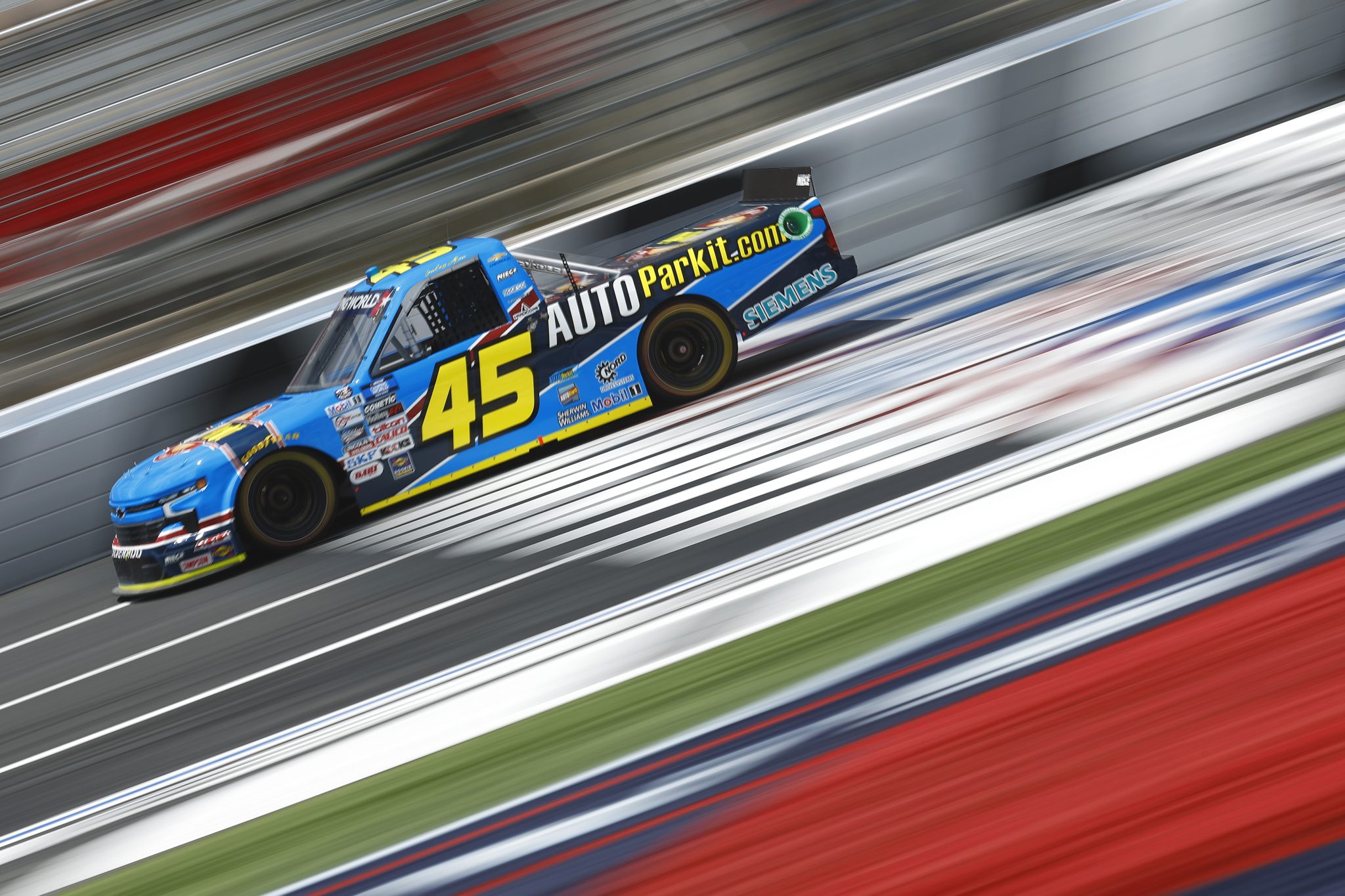 CONCORD, NORTH CAROLINA - MAY 27: Lawless Alan, driver of the #45 AUTOParkIt Chevrolet, drives during practice for the NASCAR Camping World Truck Series North Carolina Education Lottery 200 at Charlotte Motor Speedway on May 27, 2022 in Concord, North Carolina. (Photo by Jared C. Tilton/Getty Images) | Getty Images