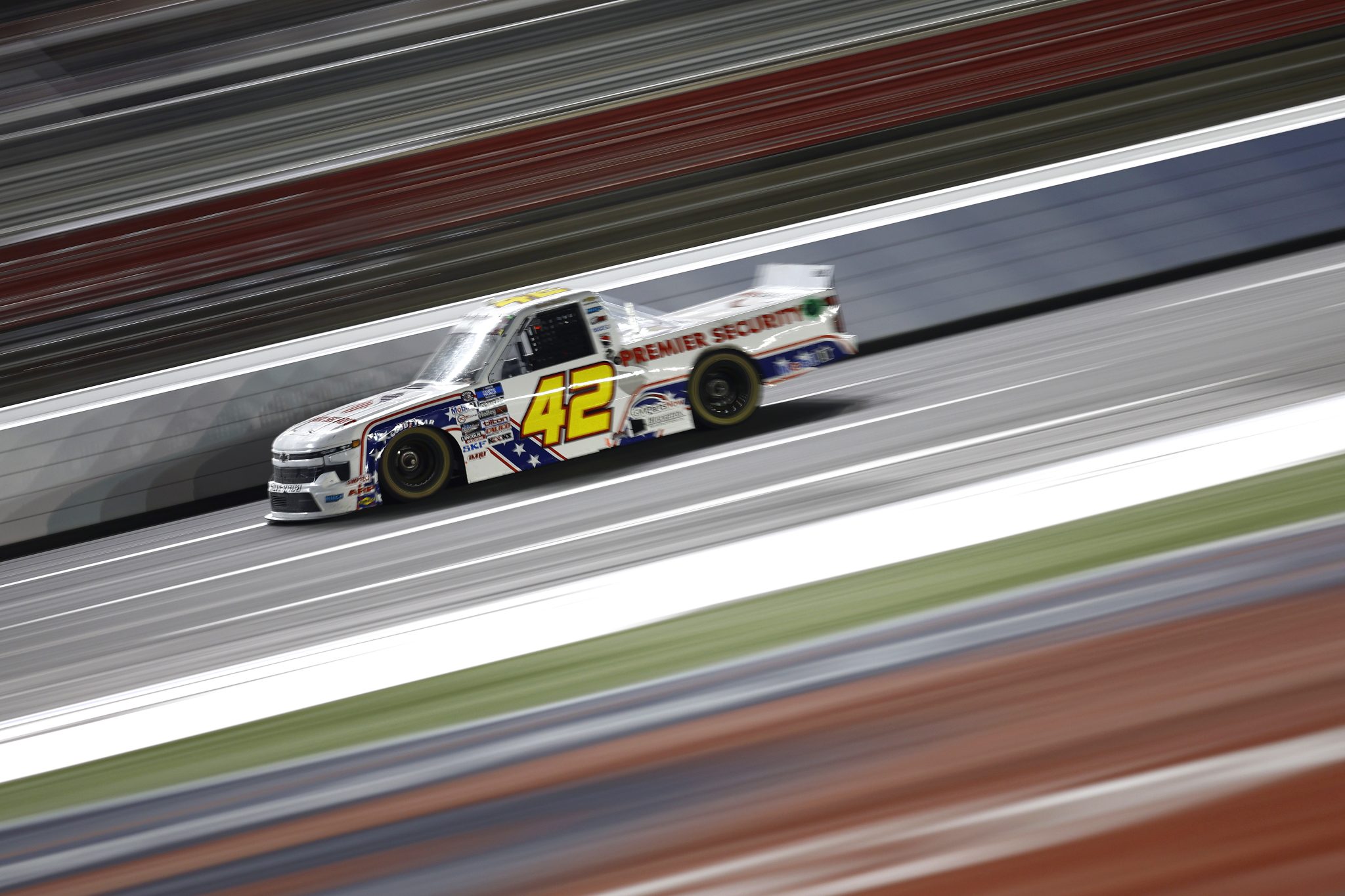 CONCORD, NORTH CAROLINA - MAY 27: Carson Hocevar, driver of the #42 Premier Security Solutions Chevrolet, drives during the NASCAR Camping World Truck Series North Carolina Education Lottery 200 at Charlotte Motor Speedway on May 27, 2022 in Concord, North Carolina. (Photo by Jared C. Tilton/Getty Images) | Getty Images