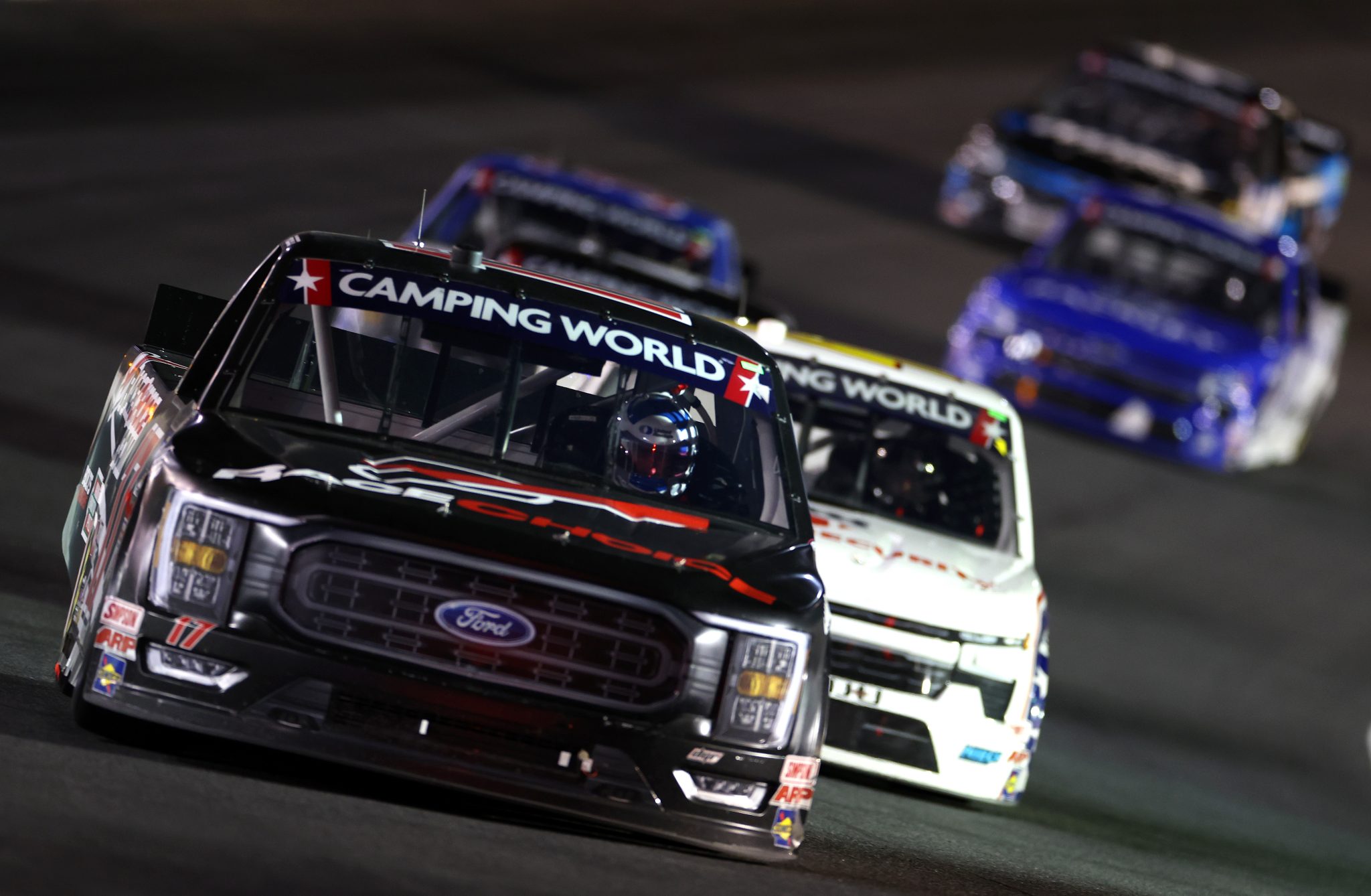 CONCORD, NORTH CAROLINA - MAY 27: Ryan Preece, driver of the #17 RaceChoice.com Ford, leads the field during the NASCAR Camping World Truck Series North Carolina Education Lottery 200 at Charlotte Motor Speedway on May 27, 2022 in Concord, North Carolina. (Photo by James Gilbert/Getty Images) | Getty Images