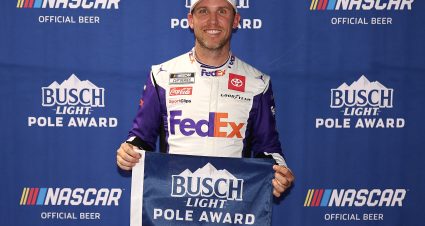 CONCORD, NORTH CAROLINA - MAY 28: Denny Hamlin, driver of the #11 FedEx Ground Toyota, poses for photos after winning the pole award during qualifying for the NASCAR Cup Series Coca-Cola 600 at Charlotte Motor Speedway on May 28, 2022 in Concord, North Carolina. (Photo by James Gilbert/Getty Images) | Getty Images