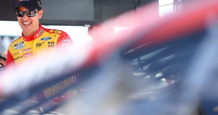 DARLINGTON, SOUTH CAROLINA - MAY 07: Joey Logano, driver of the #22 Shell Pennzoil Ford, laughs with his crew on the grid during practice for the NASCAR Cup Series Goodyear 400 at Darlington Raceway on May 07, 2022 in Darlington, South Carolina. (Photo by James Gilbert/Getty Images) | Getty Images