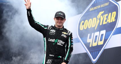 DARLINGTON, SOUTH CAROLINA - MAY 08: Justin Haley, driver of the #31 LeafFilter Gutter Protection Chevrolet, waves to fans as he walks onstage during driver intros prior to the NASCAR Cup Series Goodyear 400 at Darlington Raceway on May 08, 2022 in Darlington, South Carolina. (Photo by James Gilbert/Getty Images) | Getty Images