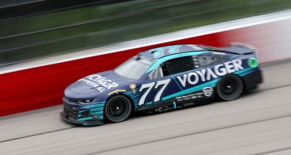 DARLINGTON, SOUTH CAROLINA - MAY 08: Landon Cassill, driver of the #77 Voyager: Crypto for All Chevrolet, drives during the NASCAR Cup Series Goodyear 400 at Darlington Raceway on May 08, 2022 in Darlington, South Carolina. (Photo by James Gilbert/Getty Images) | Getty Images