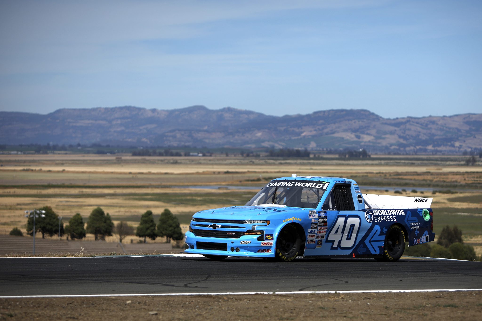 SONOMA, CALIFORNIA - JUNE 10: Dean Thompson, driver of the #40 Worldwide Express Chevrolet, drives during practice for the NASCAR Camping World Truck Series DoorDash 250 at Sonoma Raceway on June 10, 2022 in Sonoma, California. (Photo by Sean Gardner/Getty Images) | Getty Images