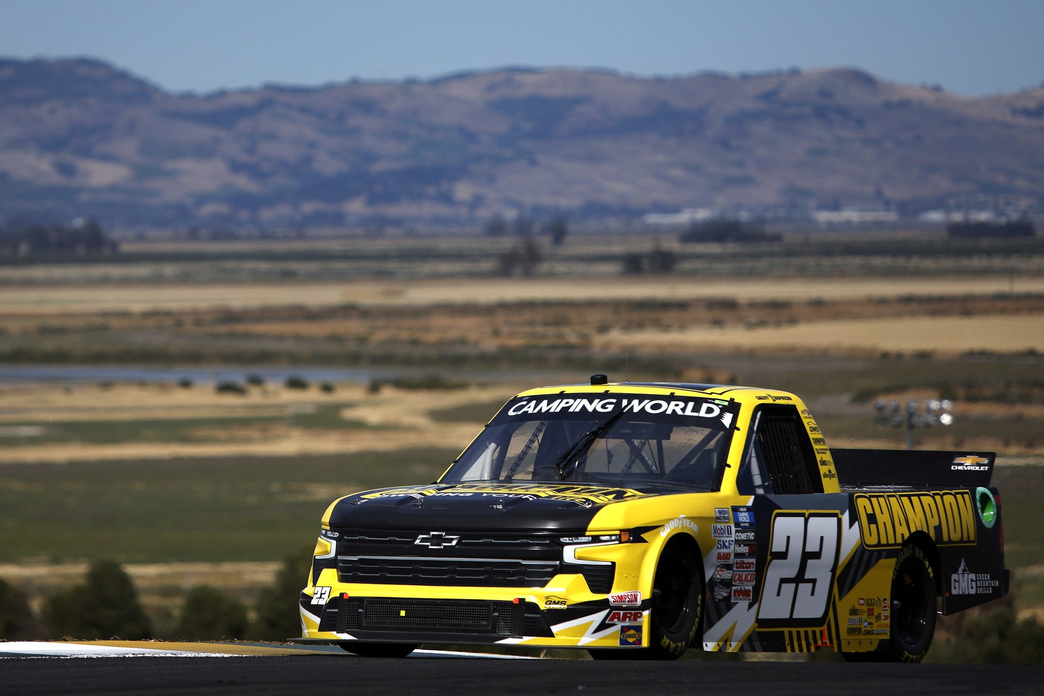 SONOMA, CALIFORNIA - JUNE 10: Grant Enfinger, driver of the #23 Champion Power Equipment Chevrolet, drives during practice for the NASCAR Camping World Truck Series DoorDash 250 at Sonoma Raceway on June 10, 2022 in Sonoma, California. (Photo by Sean Gardner/Getty Images) | Getty Images