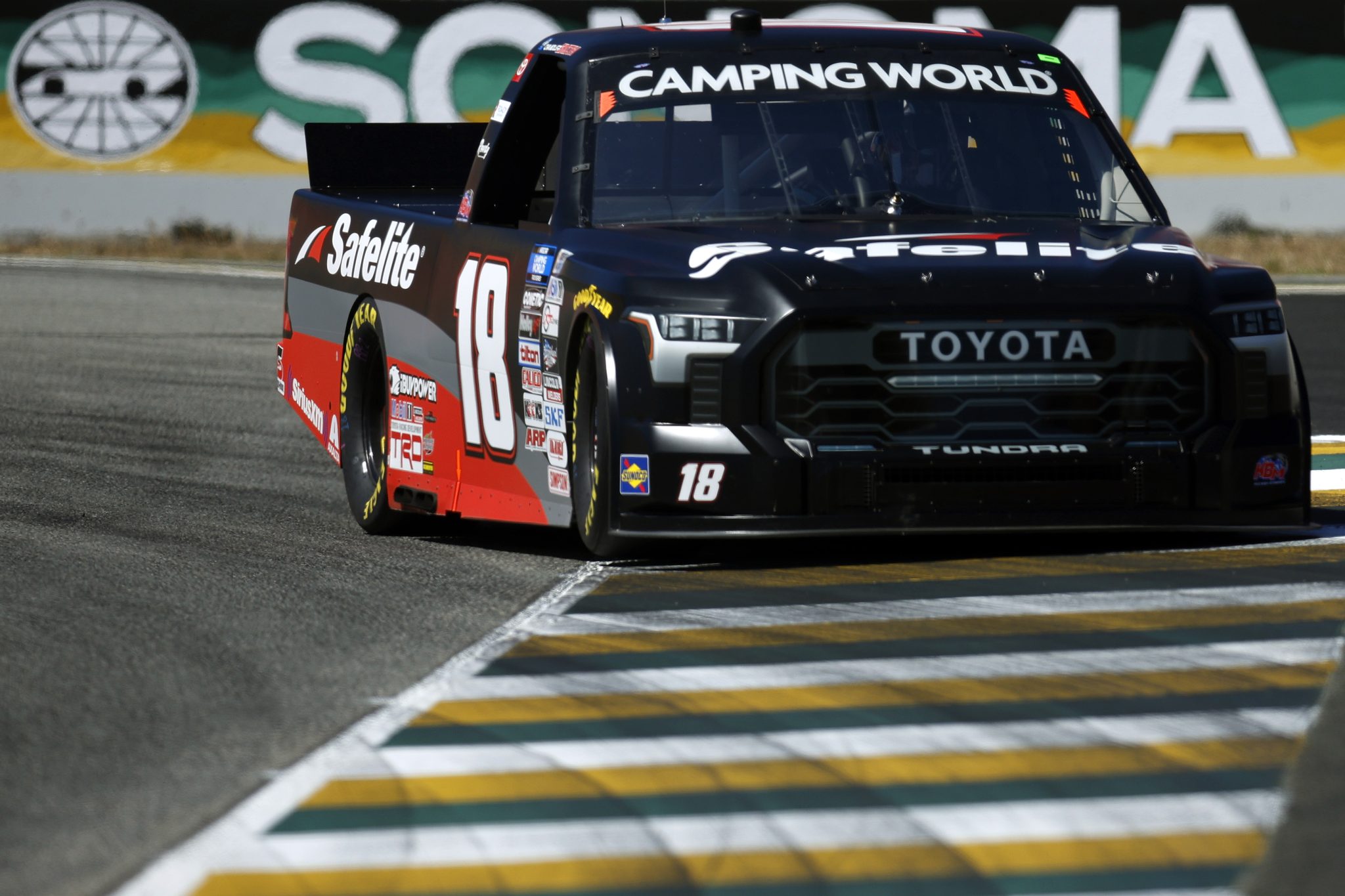 SONOMA, CALIFORNIA - JUNE 11: Chandler Smith, driver of the #18 Safelite AutoGlass Toyota, drives during qualifying for the NASCAR Camping World Truck Series DoorDash 250 at Sonoma Raceway on June 11, 2022 in Sonoma, California. (Photo by Sean Gardner/Getty Images) | Getty Images
