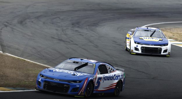 SONOMA, CALIFORNIA - JUNE 12: Kyle Larson, driver of the #5 HendrickCars.com Chevrolet, and Chase Elliott, driver of the #9 NAPA Auto Parts Chevrolet, race during the NASCAR Cup Series Toyota/Save Mart 350 at Sonoma Raceway on June 12, 2022 in Sonoma, California. (Photo by Sean Gardner/Getty Images) | Getty Images
