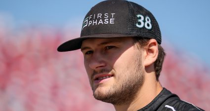TALLADEGA, ALABAMA - APRIL 23: Todd Gilliland, driver of the #38 First Phase Credit Card Ford, walks the grid during qualifying for the NASCAR Cup Series GEICO 500 at Talladega Superspeedway on April 23, 2022 in Talladega, Alabama. (Photo by James Gilbert/Getty Images) | Getty Images