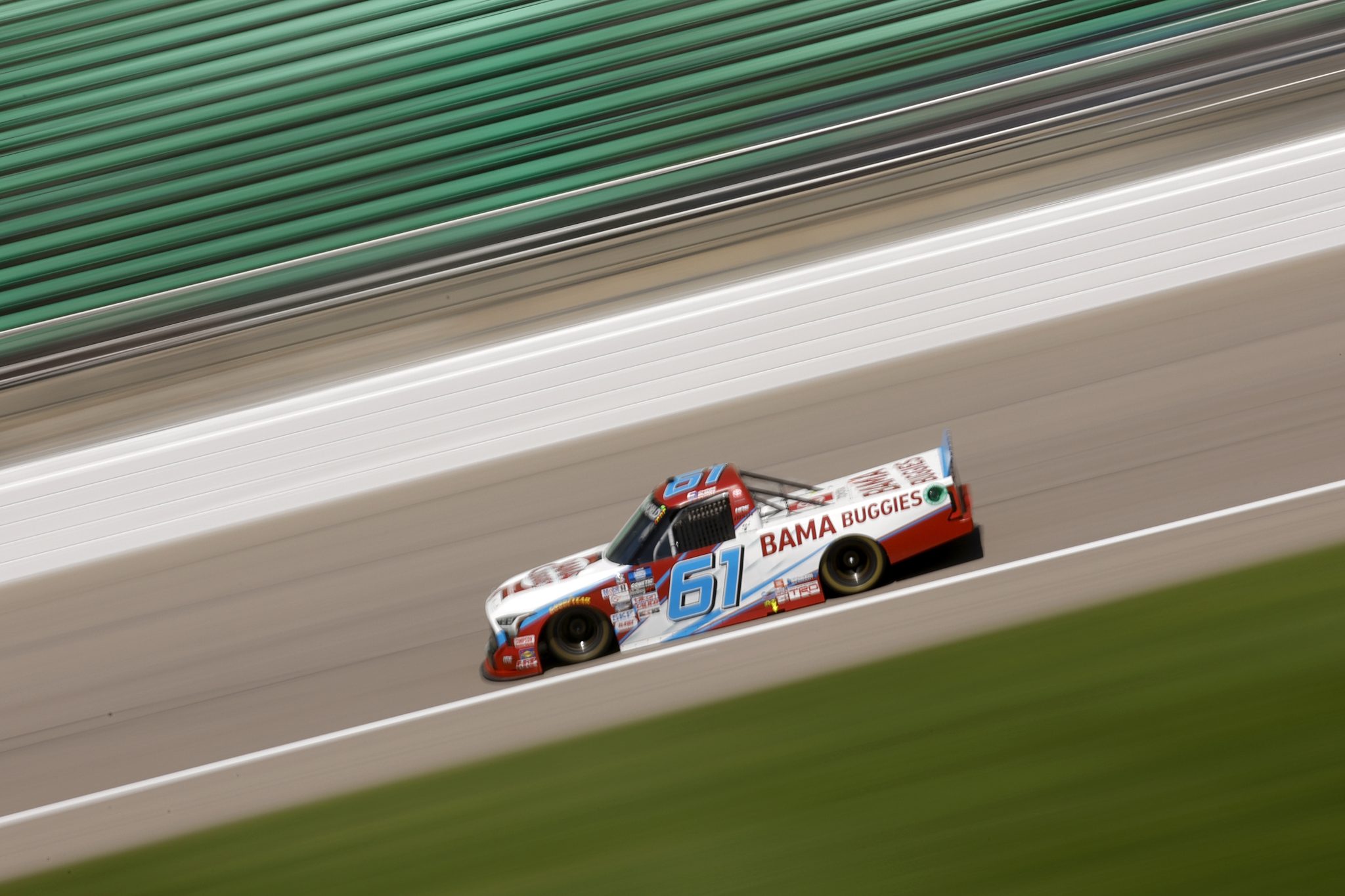 KANSAS CITY, KANSAS - MAY 14: Chase Purdy, driver of the #61 Bama Buggies Toyota, drives during practice for the NASCAR Camping World Truck Series Heart of America 200 at Kansas Speedway on May 14, 2022 in Kansas City, Kansas. (Photo by Chris Graythen/Getty Images) | Getty Images