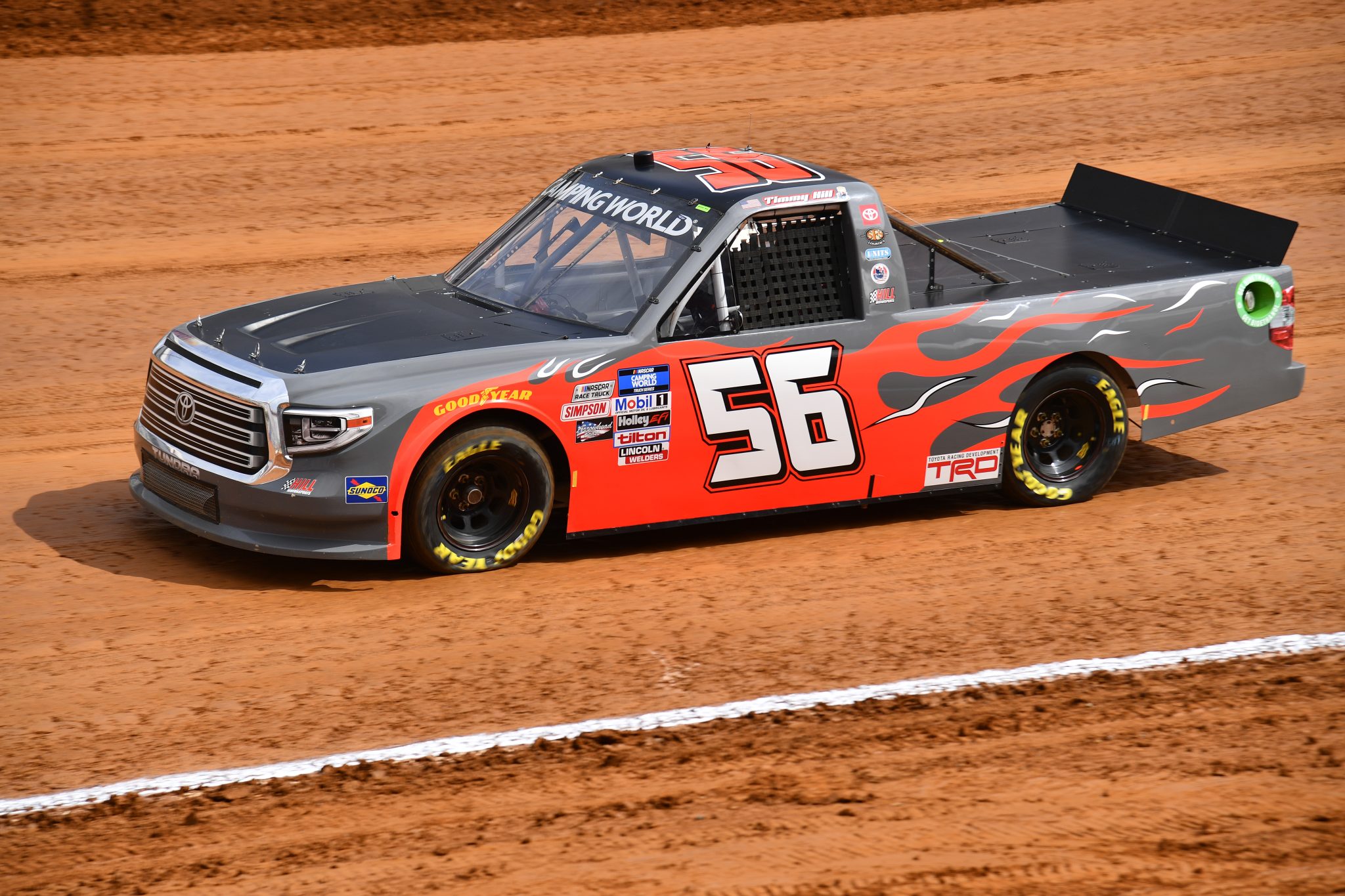 BRISTOL, TENNESSEE - APRIL 16: Timmy Hill, driver of the #56 Hill Motorsports Toyota, drives during qualifying for the NASCAR Camping World Truck Series Pinty's Truck Race on Dirt at Bristol Motor Speedway on April 16, 2022 in Bristol, Tennessee. (Photo by Logan Riely/Getty Images) | Getty Images