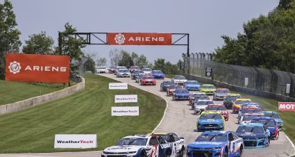 ELKHART LAKE, WISCONSIN - JULY 04: William Byron, driver of the #24 Liberty University Chevrolet, and Kyle Larson, driver of the #5 HendrickCars.com Chevrolet, race during the NASCAR Cup Series Jockey Made in America 250 Presented by Kwik Trip at Road America on July 04, 2021 in Elkhart Lake, Wisconsin. (Photo by James Gilbert/Getty Images) | Getty Images