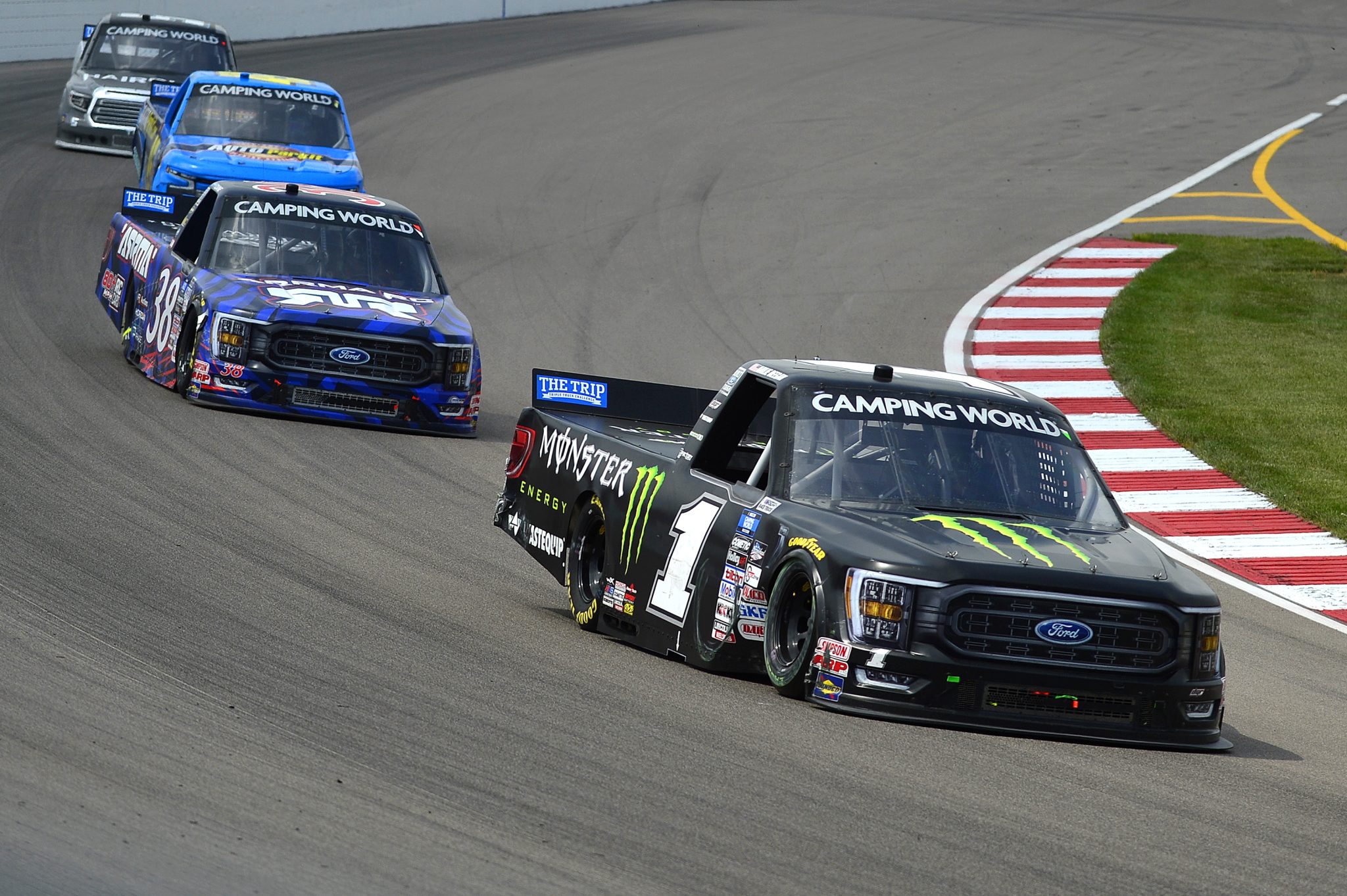 MADISON, ILLINOIS - JUNE 04: Hailie Deegan, driver of the #1 Monster Energy Ford, and Zane Smith, driver of the #38 ARRMA RC Ford, race during the NASCAR Camping World Truck Series Toyota 200 at WWT Raceway on June 04, 2022 in Madison, Illinois. (Photo by Jeff Curry/Getty Images) | Getty Images