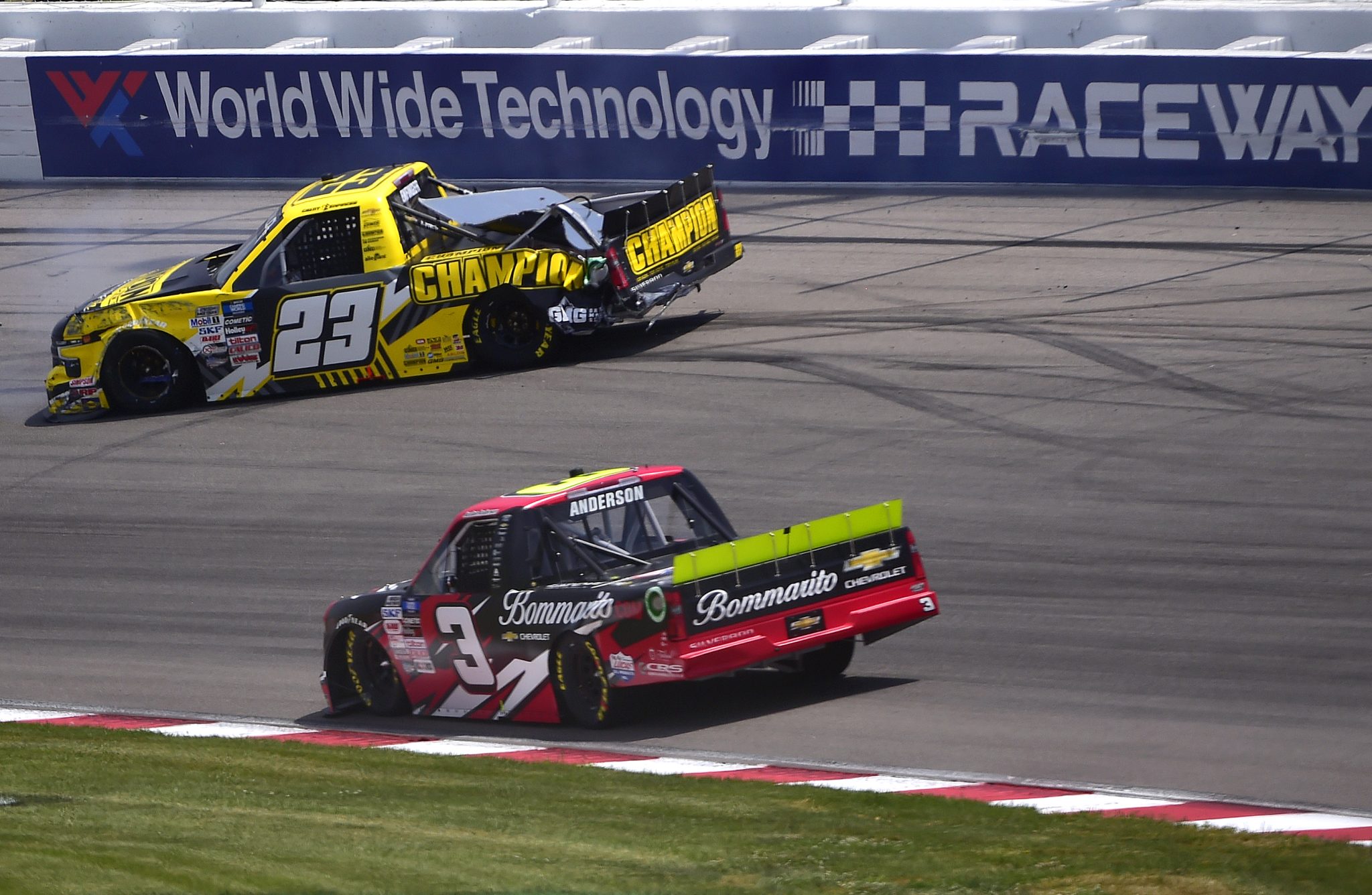 MADISON, ILLINOIS - JUNE 04: Grant Enfinger, driver of the #23 Champion Power Equipment Chevrolet, spins after an on-track incident as Jordan Anderson, driver of the #3 Bommarito Automotive Group Chevrolet, drives during the NASCAR Camping World Truck Series Toyota 200 at WWT Raceway on June 04, 2022 in Madison, Illinois. (Photo by Jeff Curry/Getty Images) | Getty Images