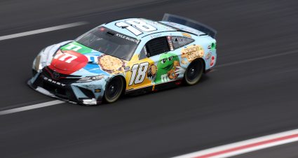 HAMPTON, GEORGIA - JULY 10: Kyle Busch, driver of the #18 M&M's Crunchy Cookie Toyota, drives during the NASCAR Cup Series Quaker State 400 at Atlanta Motor Speedway on July 10, 2022 in Hampton, Georgia. (Photo by James Gilbert/Getty Images) | Getty Images