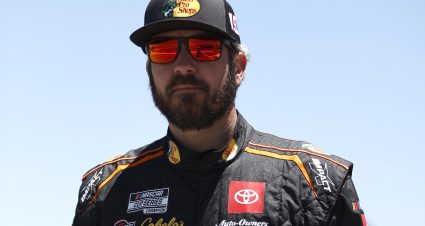 SONOMA, CALIFORNIA - JUNE 11: Martin Truex Jr., driver of the #19 Bass Pro Shops Toyota, walks the grid during practice for the NASCAR Cup Series Toyota/Save Mart 350 at Sonoma Raceway on June 11, 2022 in Sonoma, California. (Photo by Chris Graythen/Getty Images) | Getty Images