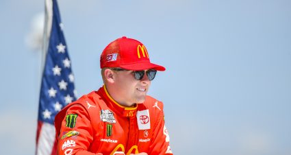 LONG POND, PENNSYLVANIA - JULY 24: Ty Gibbs, driver of the #45 McDonald's Toyota, looks on during pre-race ceremonies prior to the NASCAR Cup Series M&M's Fan Appreciation 400 at Pocono Raceway on July 24, 2022 in Long Pond, Pennsylvania. (Photo by Logan Riely/Getty Images) | Getty Images