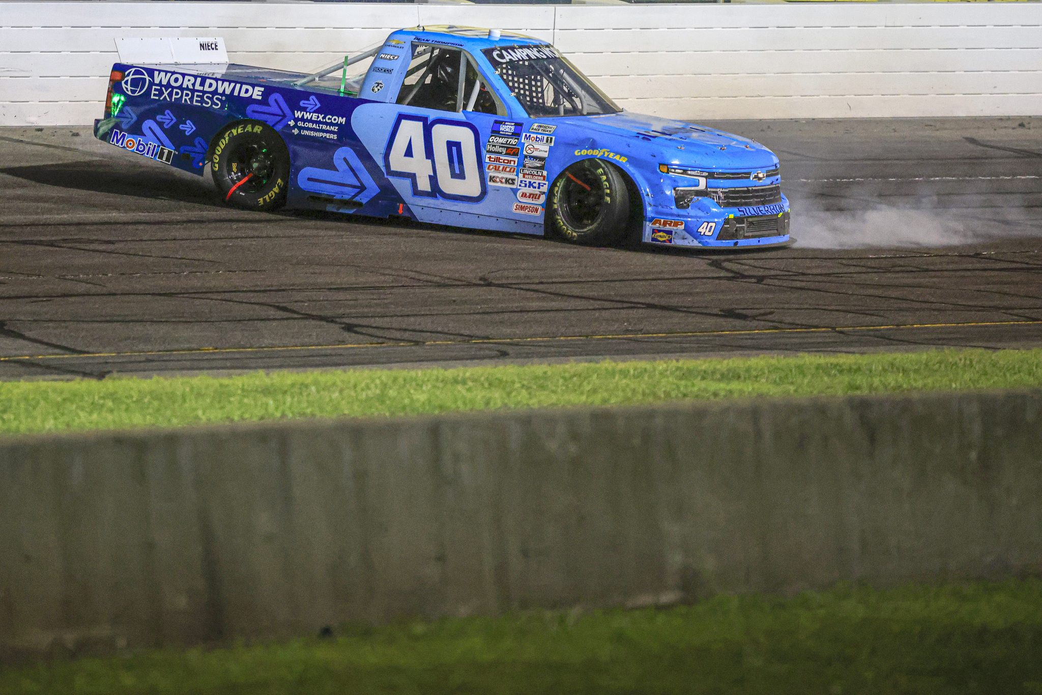INDIANAPOLIS, INDIANA - JULY 29: Dean Thompson, driver of the #40 Worldwide Express Chevrolet, spins after an on-track incident during the NASCAR Camping World Truck Series TSport 200 at Indianapolis Raceway Park on July 29, 2022 in Indianapolis, Indiana. (Photo by Justin Casterline/Getty Images)