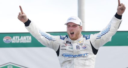 HAMPTON, GEORGIA - JULY 09: Austin Hill, driver of the #21 Bennett Transportation and Logistics Chevrolet, celebrates in victory lane after winning the NASCAR Xfinity Series Alsco Uniforms 250 at Atlanta Motor Speedway on July 09, 2022 in Hampton, Georgia. (Photo by Jared C. Tilton/Getty Images) | Getty Images