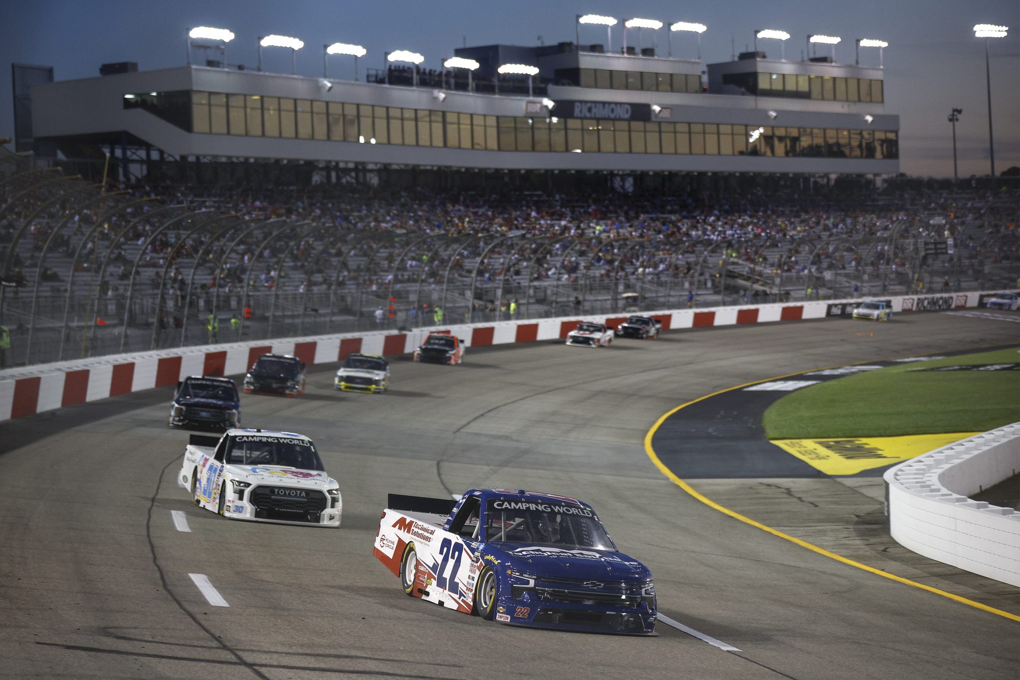 RICHMOND, VIRGINIA - AUGUST 13: Austin Wayne Self, driver of the #22 AM Technical Solutions Chevrolet, drives during the NASCAR Camping World Truck Series Worldwide Express 250 for Carrier Appreciation at Richmond Raceway on August 13, 2022 in Richmond, Virginia. (Photo by Jared C. Tilton/Getty Images) | Getty Images