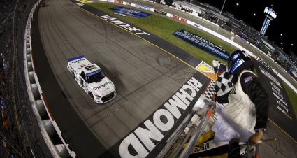 RICHMOND, VIRGINIA - AUGUST 13: Chandler Smith, driver of the #18 Charge Me Toyota, takes the checkered flag to win the NASCAR Camping World Truck Series Worldwide Express 250 for Carrier Appreciation at Richmond Raceway on August 13, 2022 in Richmond, Virginia. (Photo by Jared C. Tilton/Getty Images) | Getty Images