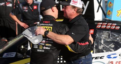 FORT WORTH, TEXAS - OCTOBER 16: John H. Nemechek, driver of the #54 Romco Equipment Toyota, hugs his father Joe Nemechek, in victory lane after winning the NASCAR Xfinity Series Andy's Frozen Custard 335 at Texas Motor Speedway on October 16, 2021 in Fort Worth, Texas. (Photo by Chris Graythen/Getty Images) | Getty Images