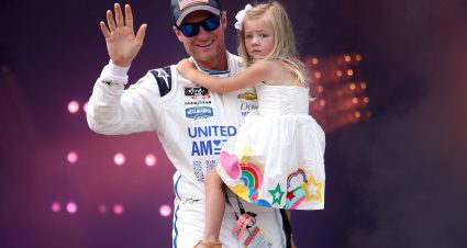 RICHMOND, VIRGINIA - SEPTEMBER 11: Dale Earnhardt Jr., driver of the #8 Unilever United For America Chevrolet, carries daughter, Isla Rose on stage during pre-race ceremonies prior to the NASCAR Xfinity Series Go Bowling 250 at Richmond Raceway on September 11, 2021 in Richmond, Virginia. (Photo by Sean Gardner/Getty Images) | Getty Images