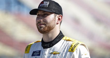 BROOKLYN, MICHIGAN - AUGUST 06: Kaz Grala, driver of the #48 Big Machine Spiked Coolers Chevrolet, walks the grid during practice for the NASCAR Xfinity Series New Holland 250 at Michigan International Speedway on August 06, 2022 in Brooklyn, Michigan. (Photo by Sean Gardner/Getty Images) | Getty Images