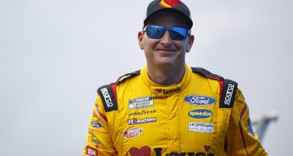 WATKINS GLEN, NEW YORK - AUGUST 21: Michael McDowell, driver of the #34 Love's Travel Stops Ford, walks onstage during driver intros prior to the NASCAR Cup Series Go Bowling at The Glen at Watkins Glen International on August 21, 2022 in Watkins Glen, New York. (Photo by Sean Gardner/Getty Images) | Getty Images
